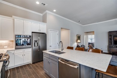 Impeccably maintained, this Briscoe floor plan offers the on Wildhorse Golf Club of Robson Ranch in Texas - for sale on GolfHomes.com, golf home, golf lot