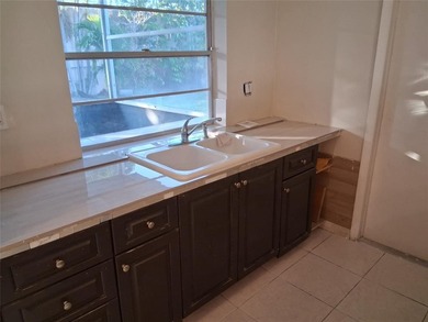 Carefree Living at Leisureville, Centrally Located In Pompano on Leisureville Community Association in Florida - for sale on GolfHomes.com, golf home, golf lot