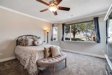 Impeccably maintained, this Briscoe floor plan offers the on Wildhorse Golf Club of Robson Ranch in Texas - for sale on GolfHomes.com, golf home, golf lot