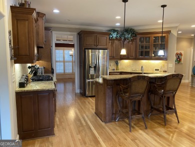 Welcome to this stunning 4-sided brick home perfectly situated on Canongate At Heron Bay in Georgia - for sale on GolfHomes.com, golf home, golf lot
