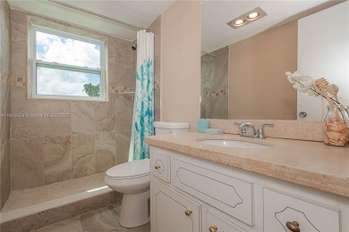 DELUXE CORNER UNIT WITH EXTRA WINDOWS - EASY TO SHOW - ALL AGES on Palm-Aire Country Club and Resort - The Oaks in Florida - for sale on GolfHomes.com, golf home, golf lot