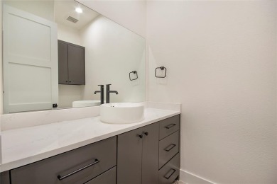 Step inside this stunning two bedroom townhome in Heath Golf and on Heath Golf and Yacht Club in Texas - for sale on GolfHomes.com, golf home, golf lot