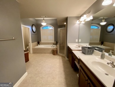 Welcome to this stunning 4-sided brick home perfectly situated on Canongate At Heron Bay in Georgia - for sale on GolfHomes.com, golf home, golf lot