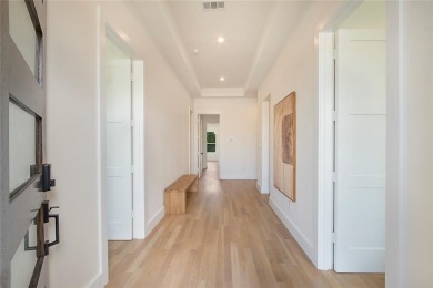 Step inside this stunning two bedroom townhome in Heath Golf and on Heath Golf and Yacht Club in Texas - for sale on GolfHomes.com, golf home, golf lot