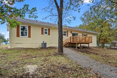 This home is in the community of Linn Valley Lakes. A wonderful on Linn Valley Lakes - Deer Trace Golf Course in Kansas - for sale on GolfHomes.com, golf home, golf lot