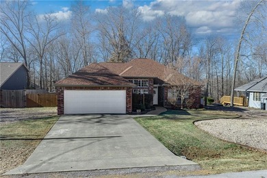 Welcome to this newly refreshed 4-bed, 2-bath home in the on Bella Vista - Metfield Golf Complex and Country Club in Arkansas - for sale on GolfHomes.com, golf home, golf lot