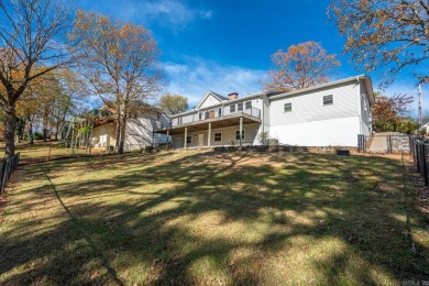 Comfortable handicap accessible home with large deck overlooking on Diamondhead Golf and Country Club in Arkansas - for sale on GolfHomes.com, golf home, golf lot