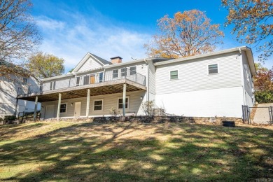 Comfortable handicap accessible home with large deck overlooking on Diamondhead Golf and Country Club in Arkansas - for sale on GolfHomes.com, golf home, golf lot