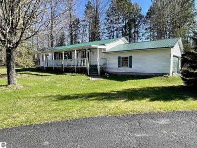 Almost 2 acres on the Manistee-Benzie county line.  This well on Crystal Mountain Golf Course in Michigan - for sale on GolfHomes.com, golf home, golf lot