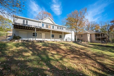 Comfortable handicap accessible home with large deck overlooking on Diamondhead Golf and Country Club in Arkansas - for sale on GolfHomes.com, golf home, golf lot