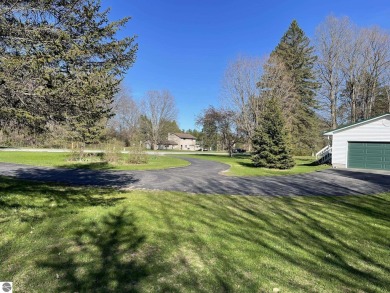 Almost 2 acres on the Manistee-Benzie county line.  This well on Crystal Mountain Golf Course in Michigan - for sale on GolfHomes.com, golf home, golf lot