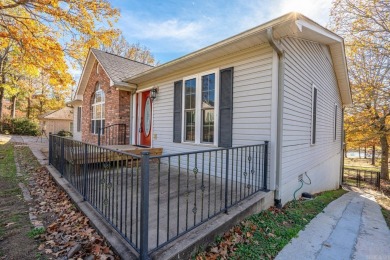 Comfortable handicap accessible home with large deck overlooking on Diamondhead Golf and Country Club in Arkansas - for sale on GolfHomes.com, golf home, golf lot