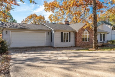 Comfortable handicap accessible home with large deck overlooking on Diamondhead Golf and Country Club in Arkansas - for sale on GolfHomes.com, golf home, golf lot