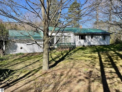 Almost 2 acres on the Manistee-Benzie county line.  This well on Crystal Mountain Golf Course in Michigan - for sale on GolfHomes.com, golf home, golf lot