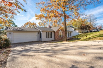 Comfortable handicap accessible home with large deck overlooking on Diamondhead Golf and Country Club in Arkansas - for sale on GolfHomes.com, golf home, golf lot