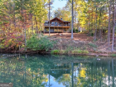 Overlooking a serene hidden lake-known by some residents as on White Path Golf Club in Georgia - for sale on GolfHomes.com, golf home, golf lot