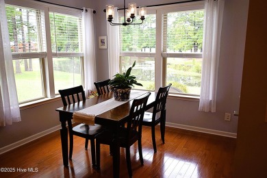 Discover this beautifully maintained home at 1014 Meadowlands on Meadowlands Golf Club in North Carolina - for sale on GolfHomes.com, golf home, golf lot