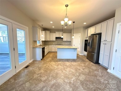 Nestled in the prestigious gated community of Bear Creek within on The Palisades Country Club in North Carolina - for sale on GolfHomes.com, golf home, golf lot