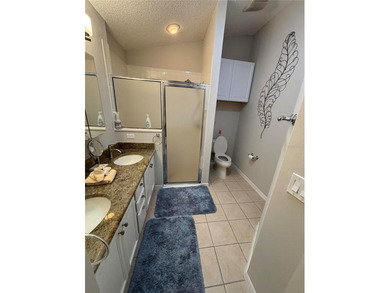 This home is in a desirable area and features an extra room off on Bacall Executive Golf Course in Florida - for sale on GolfHomes.com, golf home, golf lot