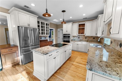 Stunning 4BR, 2.5BA Lowcountry home with sweeping porches on Southbridge Golf Club in Georgia - for sale on GolfHomes.com, golf home, golf lot