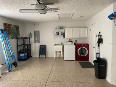 This home is in a desirable area and features an extra room off on Bacall Executive Golf Course in Florida - for sale on GolfHomes.com, golf home, golf lot