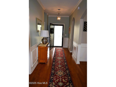 Discover this beautifully maintained home at 1014 Meadowlands on Meadowlands Golf Club in North Carolina - for sale on GolfHomes.com, golf home, golf lot