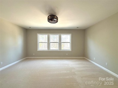 Nestled in the prestigious gated community of Bear Creek within on The Palisades Country Club in North Carolina - for sale on GolfHomes.com, golf home, golf lot