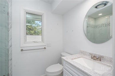 Multiple views can be enjoyed from this 3BR/3.5BA patio home in on The Landings Club - Marshwood in Georgia - for sale on GolfHomes.com, golf home, golf lot