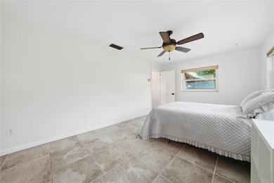 Under contract-accepting backup offers. NEW PRICE! Life in on St. Petersburg Country Club in Florida - for sale on GolfHomes.com, golf home, golf lot