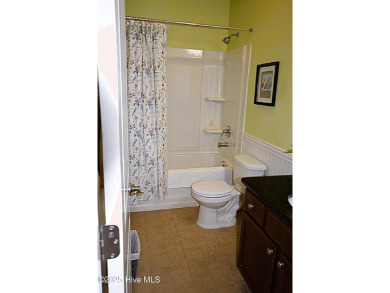 Discover this beautifully maintained home at 1014 Meadowlands on Meadowlands Golf Club in North Carolina - for sale on GolfHomes.com, golf home, golf lot