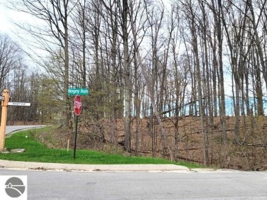 This is an easy to find property on the corner of Bogey Run and on Shanty Creek Golf Course in Michigan - for sale on GolfHomes.com, golf home, golf lot