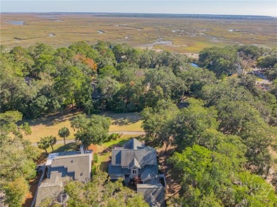 Multiple views can be enjoyed from this 3BR/3.5BA patio home in on The Landings Club - Marshwood in Georgia - for sale on GolfHomes.com, golf home, golf lot