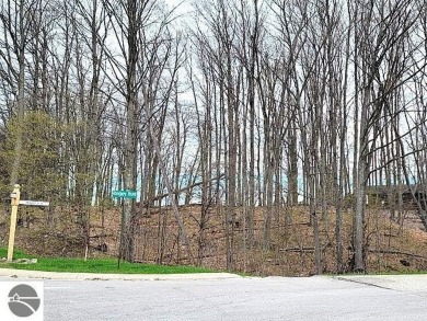 This is an easy to find property on the corner of Bogey Run and on Shanty Creek Golf Course in Michigan - for sale on GolfHomes.com, golf home, golf lot