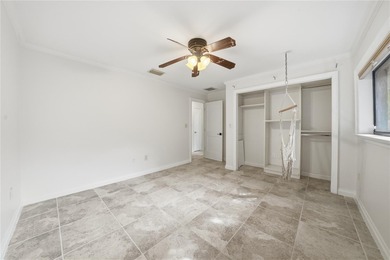 Under contract-accepting backup offers. NEW PRICE! Life in on St. Petersburg Country Club in Florida - for sale on GolfHomes.com, golf home, golf lot