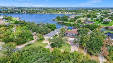 The lake house of your dreams is here! Spacious, luxurious on Lake Kiowa Golf Course in Texas - for sale on GolfHomes.com, golf home, golf lot