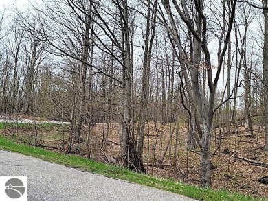 This is an easy to find property on the corner of Bogey Run and on Shanty Creek Golf Course in Michigan - for sale on GolfHomes.com, golf home, golf lot