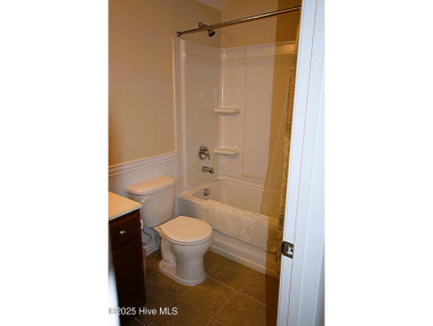 Discover this beautifully maintained home at 1014 Meadowlands on Meadowlands Golf Club in North Carolina - for sale on GolfHomes.com, golf home, golf lot