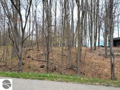 This is an easy to find property on the corner of Bogey Run and on Shanty Creek Golf Course in Michigan - for sale on GolfHomes.com, golf home, golf lot