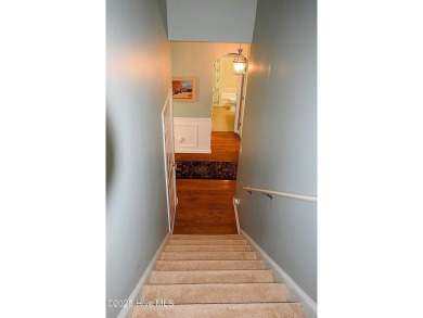 Discover this beautifully maintained home at 1014 Meadowlands on Meadowlands Golf Club in North Carolina - for sale on GolfHomes.com, golf home, golf lot