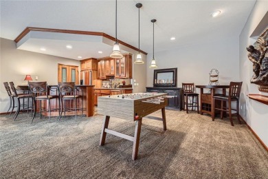 Welcome to this stunning 4 bedroom, 5 bath walkout rambler on Bearpath Golf and Country Club in Minnesota - for sale on GolfHomes.com, golf home, golf lot