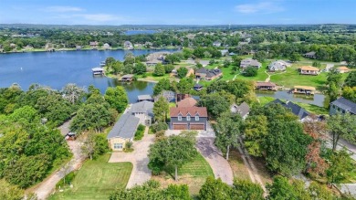 The lake house of your dreams is here! Spacious, luxurious on Lake Kiowa Golf Course in Texas - for sale on GolfHomes.com, golf home, golf lot