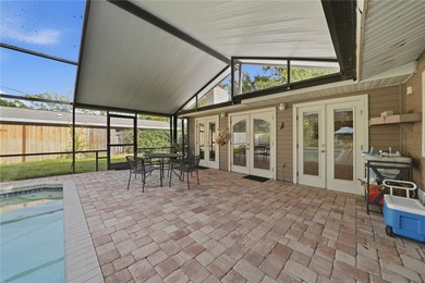 Under contract-accepting backup offers. NEW PRICE! Life in on St. Petersburg Country Club in Florida - for sale on GolfHomes.com, golf home, golf lot