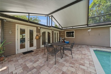 Under contract-accepting backup offers. NEW PRICE! Life in on St. Petersburg Country Club in Florida - for sale on GolfHomes.com, golf home, golf lot