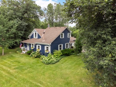 This classic farmhouse has been thoughtfully updated, blending on Red Oak Golf Course in Minnesota - for sale on GolfHomes.com, golf home, golf lot