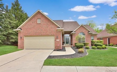 Situated on a prime lot in the exclusive Orchards Golf Course on The Orchards Golf Club in Michigan - for sale on GolfHomes.com, golf home, golf lot