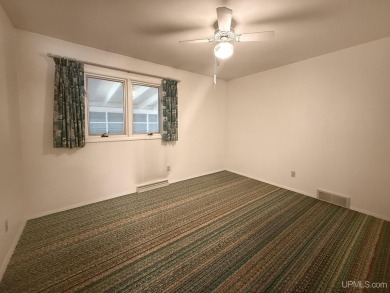 Enjoy the benefits of one-level living in this 3 bedroom, 2 bath on Pine Grove Country Club in Michigan - for sale on GolfHomes.com, golf home, golf lot