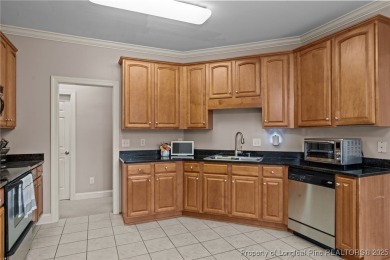 The best of both worlds! Family time downstairs & a bonus room on Anderson Creek Golf Club in North Carolina - for sale on GolfHomes.com, golf home, golf lot
