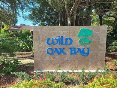 PRICE REDUCTION!  Stunning Wild Oak Bay Villa with Exceptional on IMG Academies Golf and Country Club in Florida - for sale on GolfHomes.com, golf home, golf lot