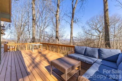 Wake up each day to breathtaking long-range mountain views and on High Vista Country Club in North Carolina - for sale on GolfHomes.com, golf home, golf lot