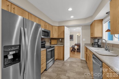 Wake up each day to breathtaking long-range mountain views and on High Vista Country Club in North Carolina - for sale on GolfHomes.com, golf home, golf lot